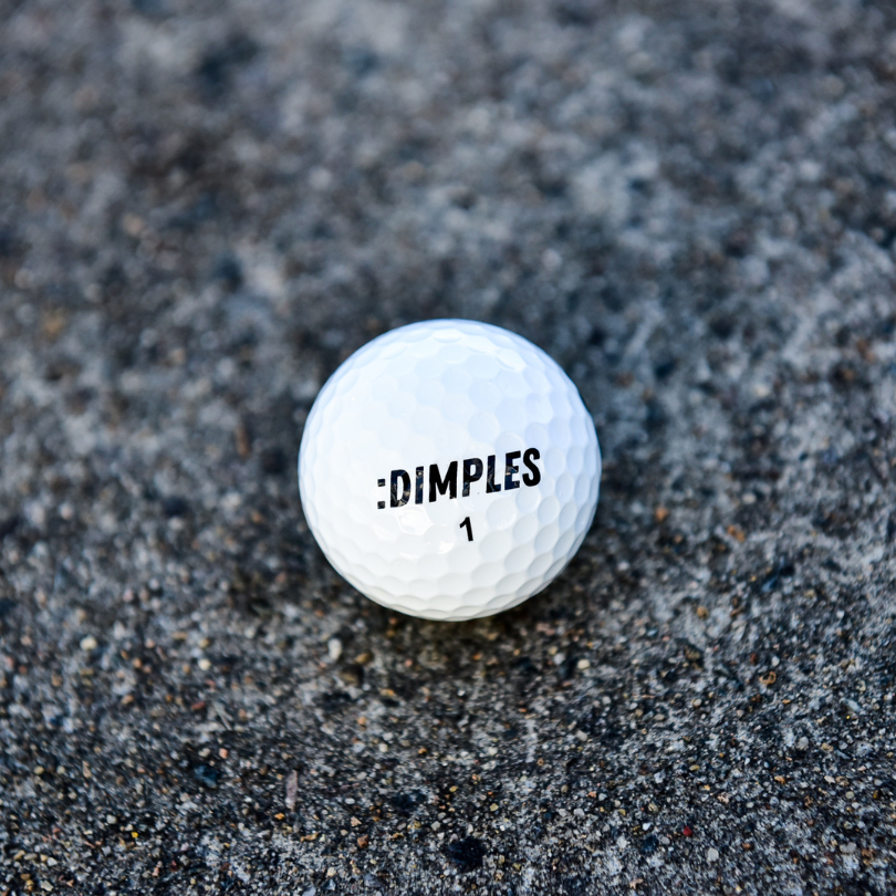 Single Dimples Pro Just White Golf Ball Showing Logo And Ball Number